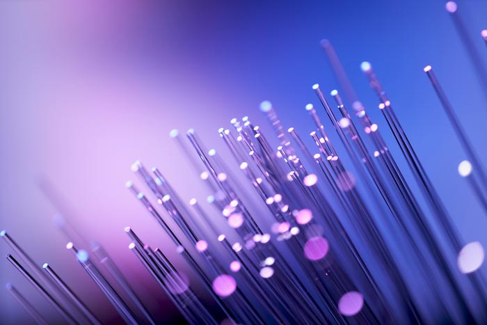 FTTP uses fibre-optic cables to transmit data. Most leased lines do too, but they also offer an uncontended service.